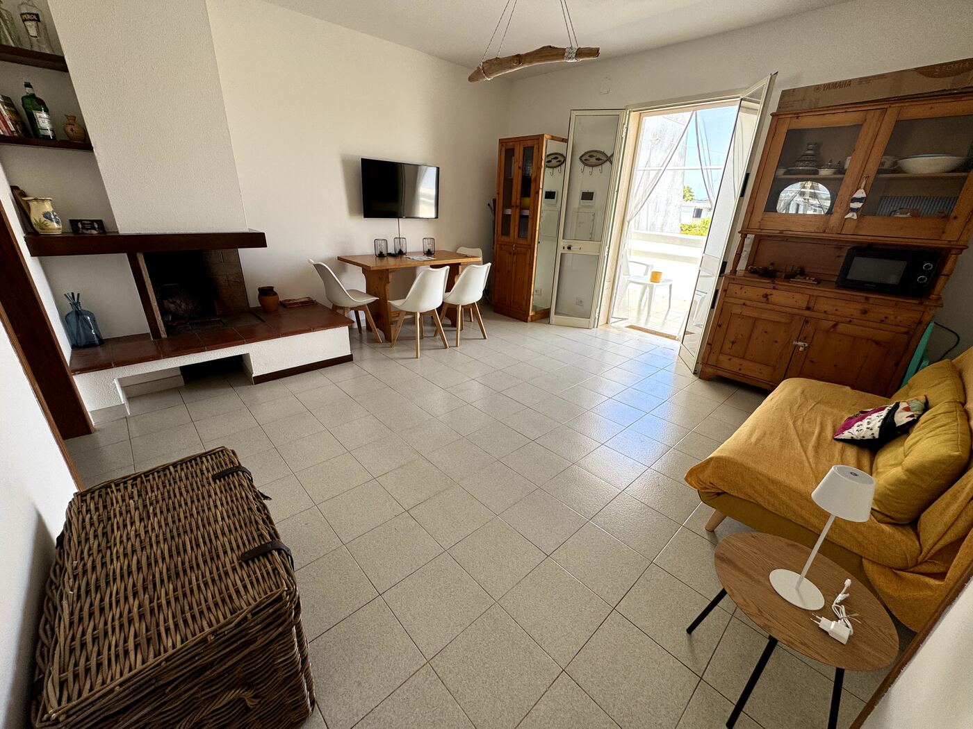 Open-plan living room with dining area and TV corner